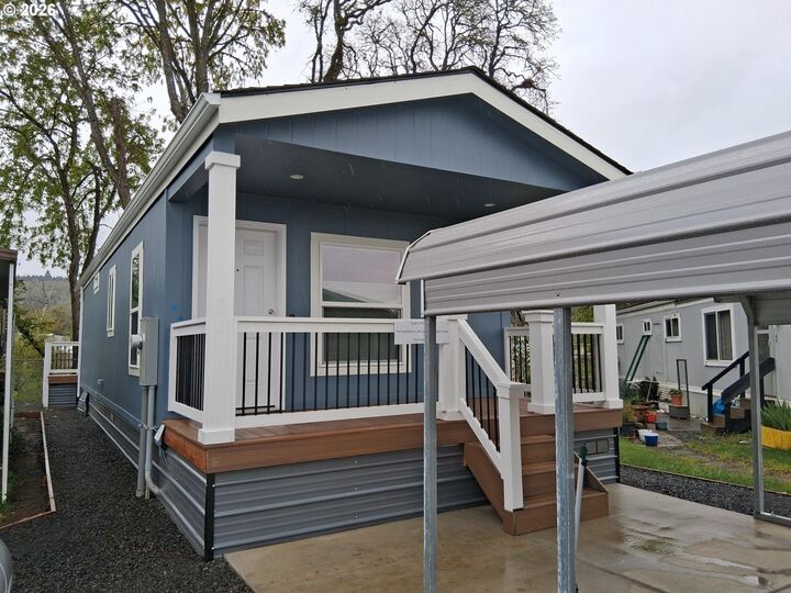 Property Photo:  503 SE Sheridan 34  OR 97378 