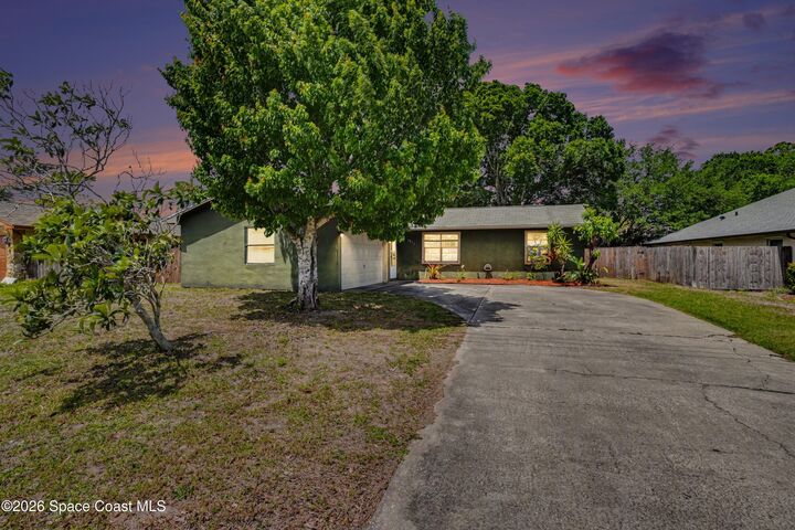 Property Photo: 3815 Jupiter Boulevard SE FL 32909