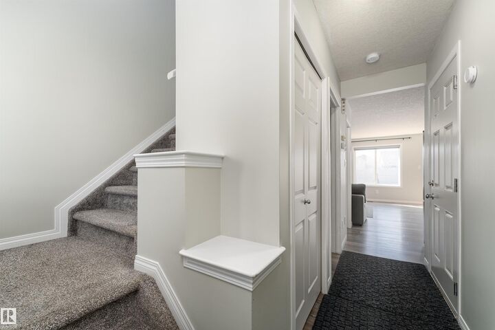 Property Photo:  5911 8 Avenue SW  AB T6X 0G5 