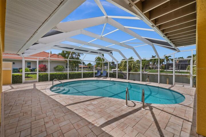 Property Photo:  1223 SW 51st Street  FL 33914 