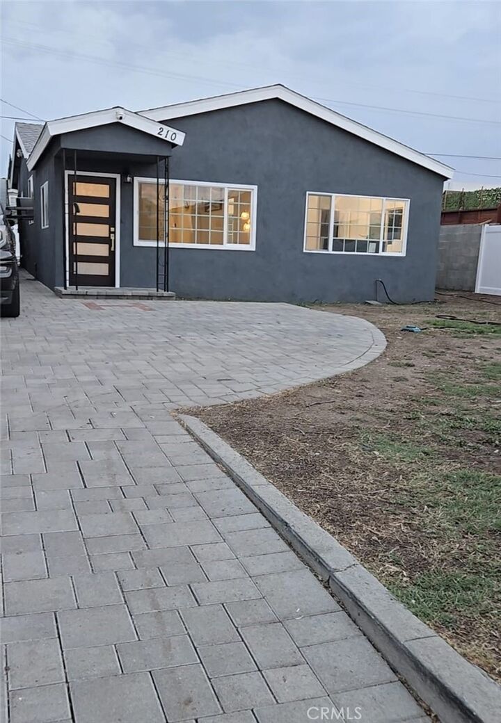 Property Photo:  210 W 113th  CA 90061 