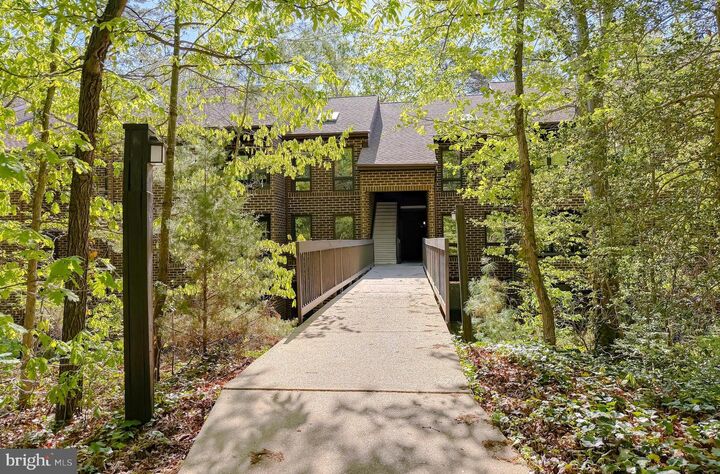 Property Photo:  23242 Chestnut Oak Court 9E  MD 20619 