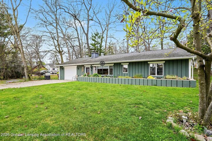 Property Photo:  6275 Lake Drive  MI 48840 