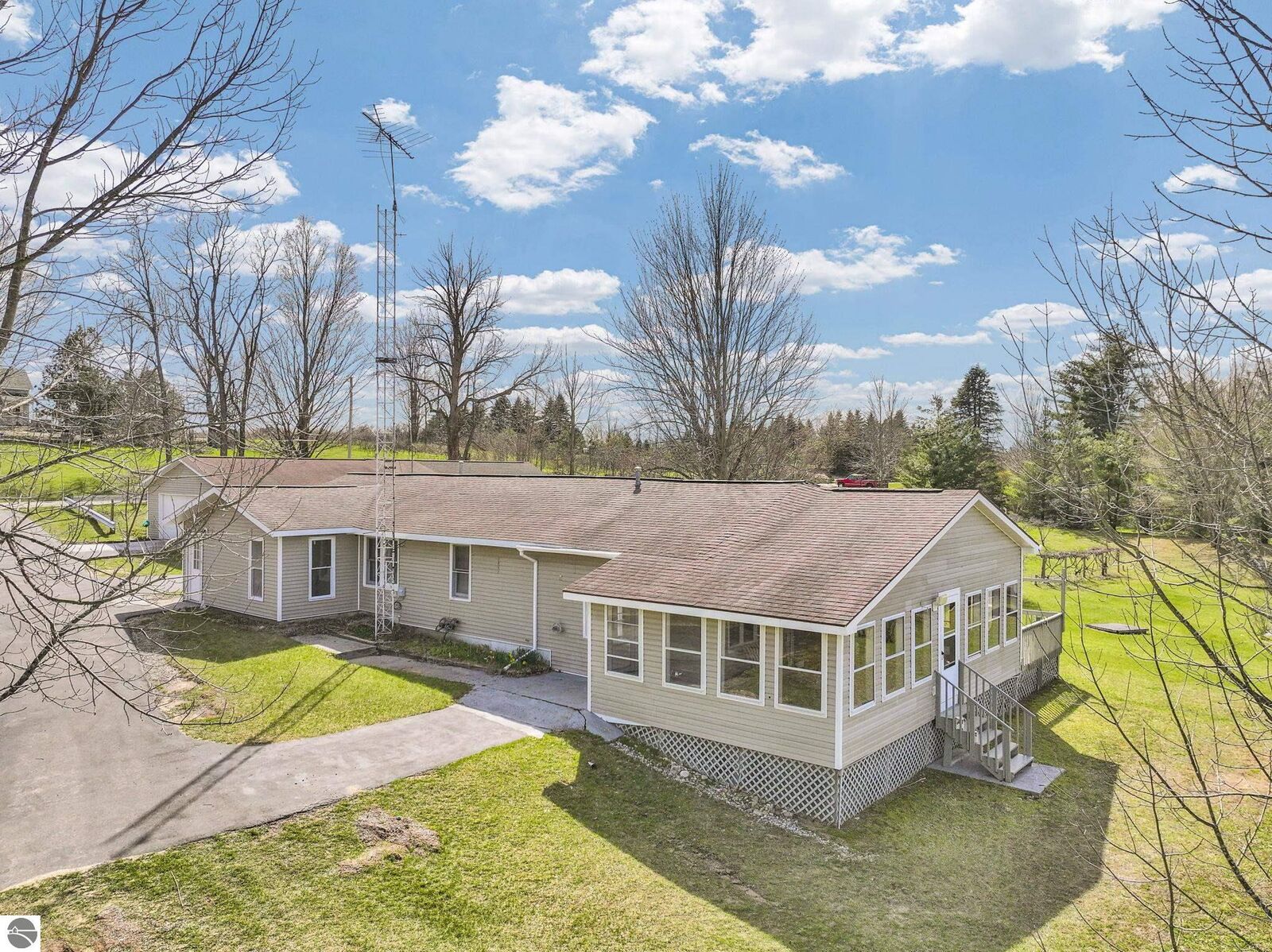 Property Photo:  10976 E 3 Mile Road  MI 49656 