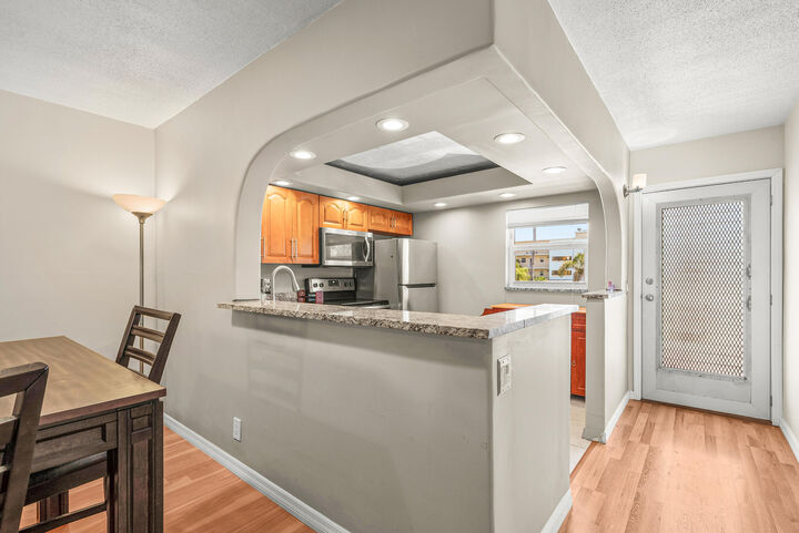 Property Photo:  2615 NE 1st Court 203  FL 33435 