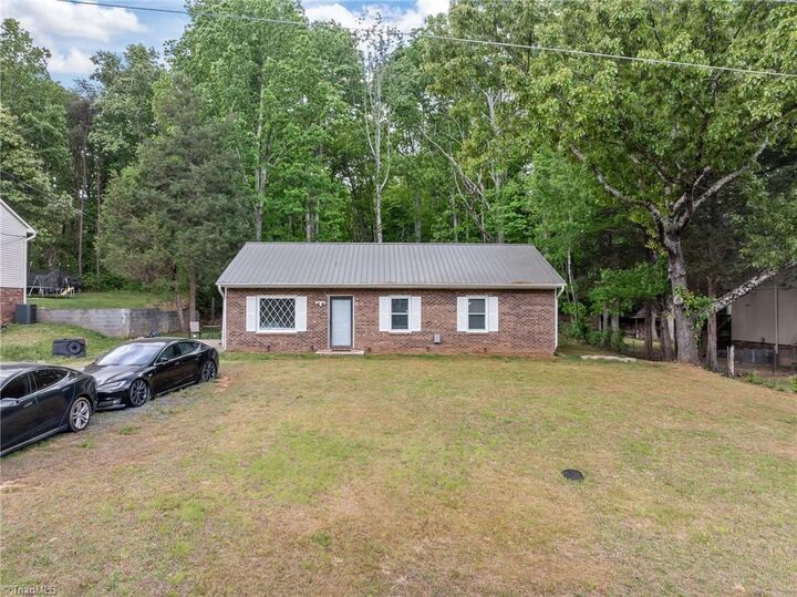 Property Photo:  5124 Tall Tree Drive  NC 27105 