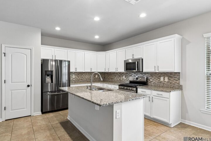 Property Photo:  16255 White Rose Dr  LA 70817 