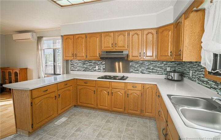 Property Photo:  6842 Route 8  NB E9C 2H4 