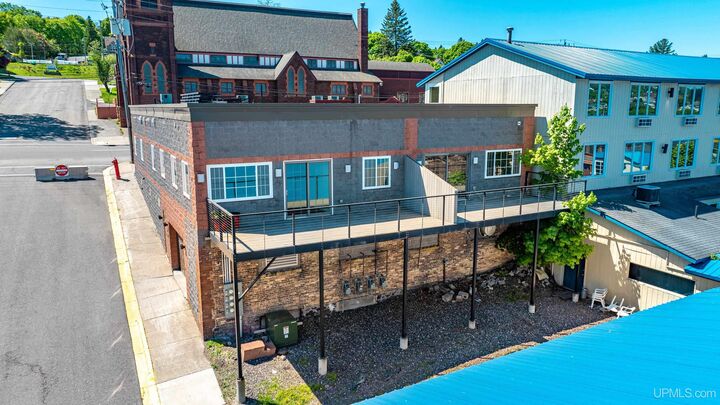 Property Photo:  208 E Montezuma Avenue  MI 49931 