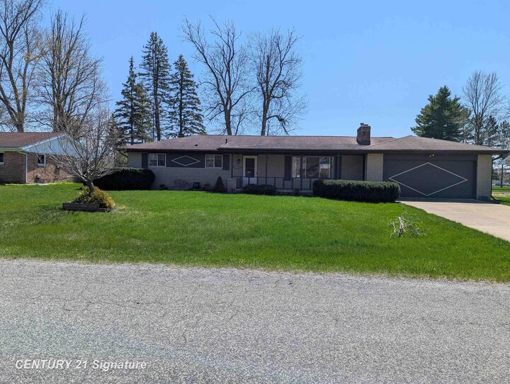 Property Photo:  1040 Wheelock Street  MI 48623 