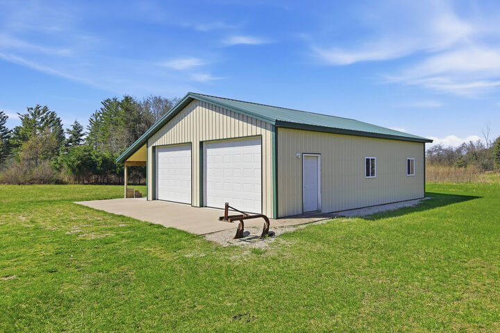 Property Photo:  4087 4 Mile Road  MI 49679 