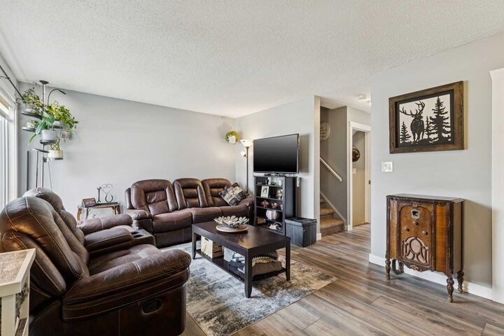 Property Photo:  107 Elm Place 113  AB T1S 1J1 