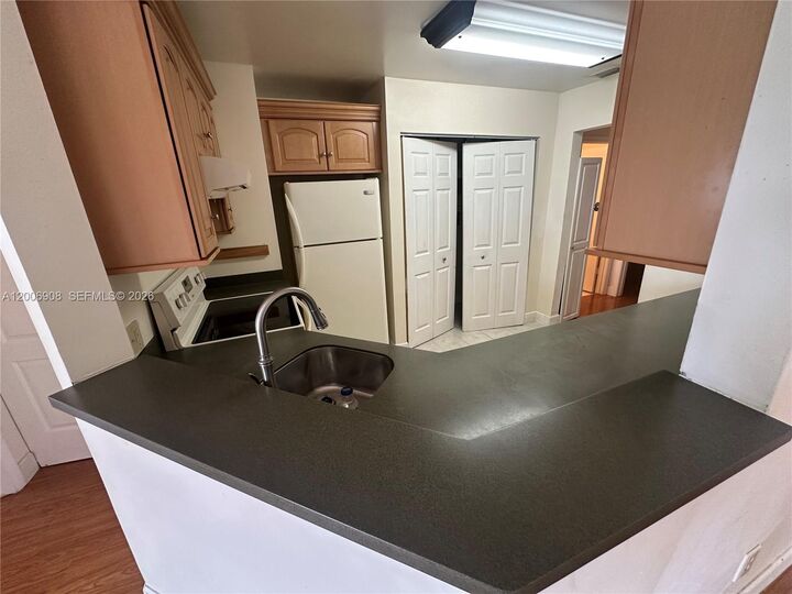 Property Photo:  3461 NW 44th St 206  FL 33309 