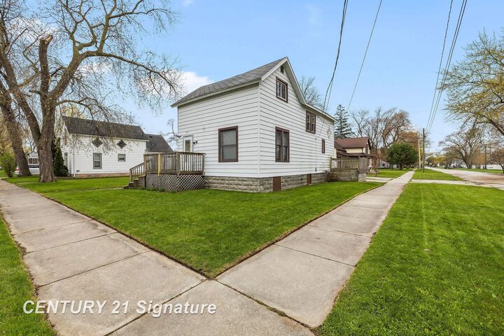 Property Photo:  407 Ottawa Street  MI 48706 