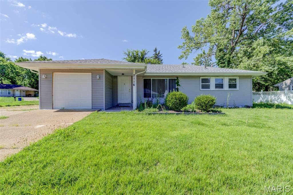 Property Photo:  2116 Jannette Drive  MO 63136 
