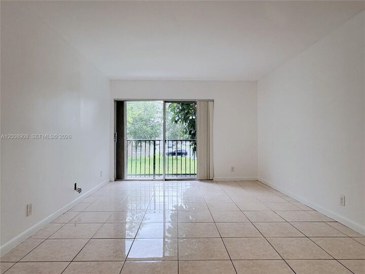 Property Photo:  8550 N Sherman Cir 205  FL 33025 