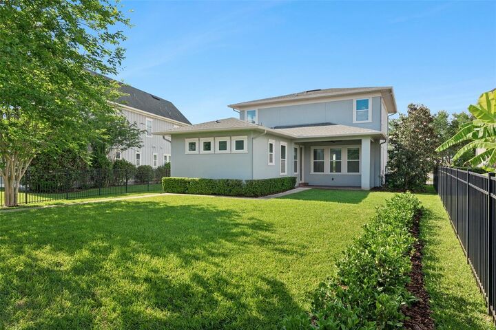 Property Photo: 9044 Tavistock Lakes Boulevard FL 32827