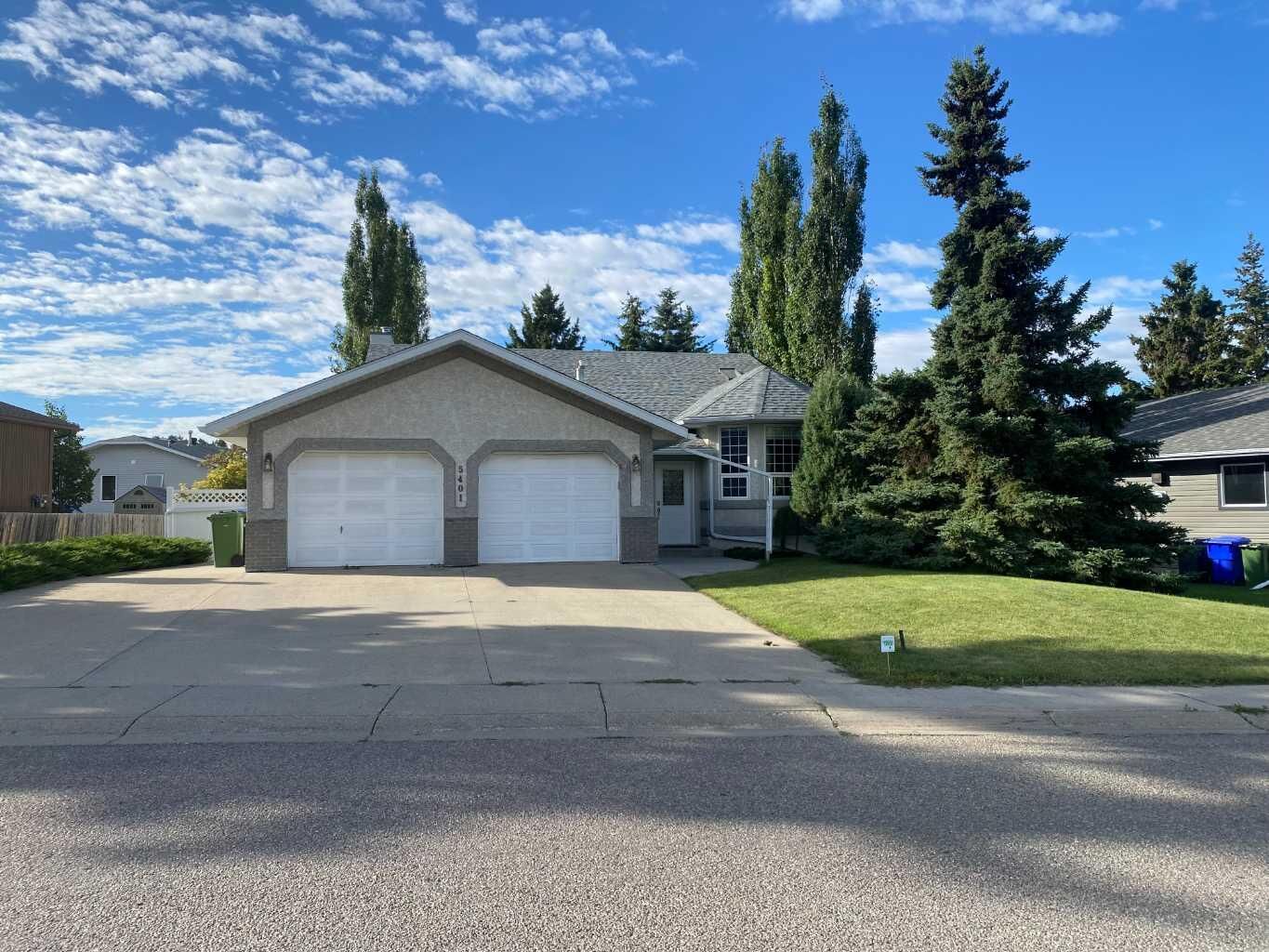 Property Photo: 5401 Shannon Drive AB T4H 1C2