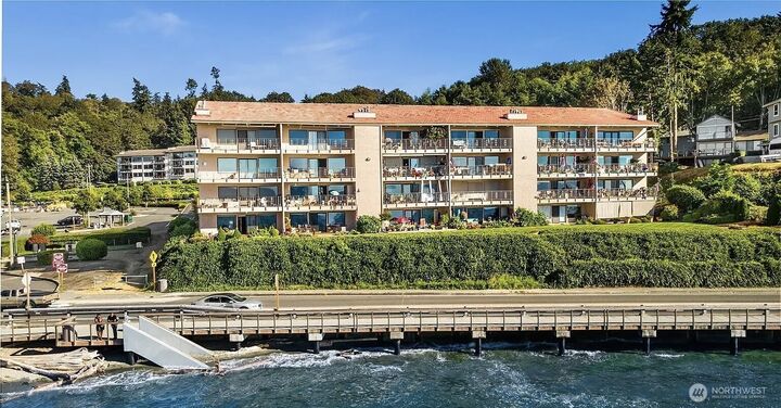 Property Photo:  28303  Sound View Drive S 102  WA 98198 