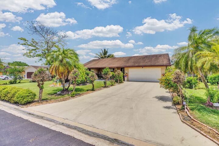 Property Photo:  164 Meadowlark Drive  FL 33411 