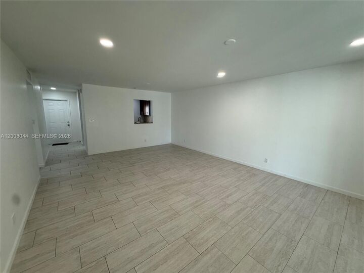Property Photo:  609 NE 14th Ave 108  FL 33009 