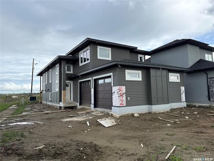 Property Photo: 492 Woolf Bend SK S7W 1E4