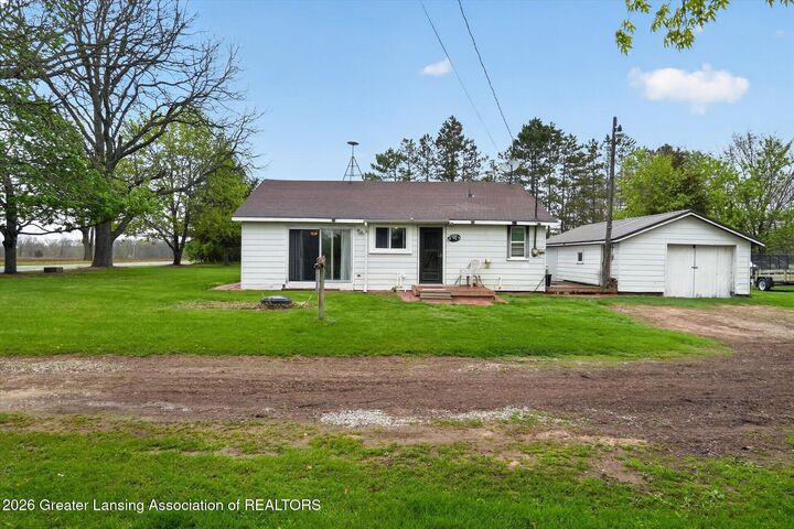 Property Photo:  6834 N Wacousta Road  MI 48835 