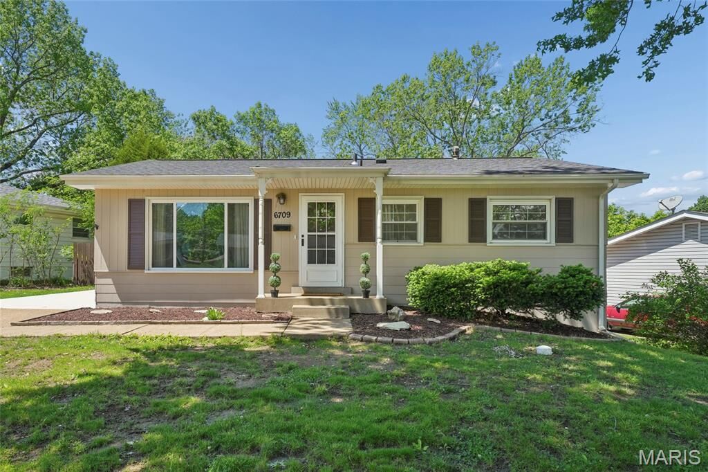 Property Photo:  6709 Village Square Drive  MO 63042 