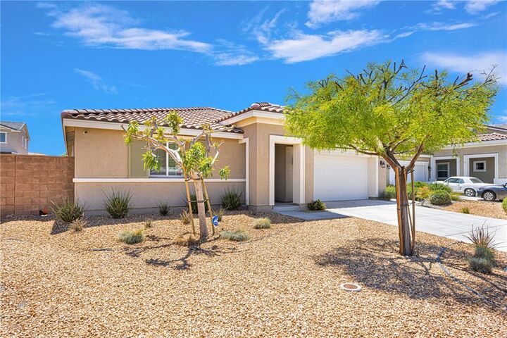 Property Photo:  13039 Eastwind Way  CA 92392 