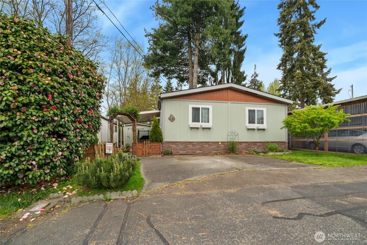 Property Photo:  24222  54th Avenue W 17  WA 98043 
