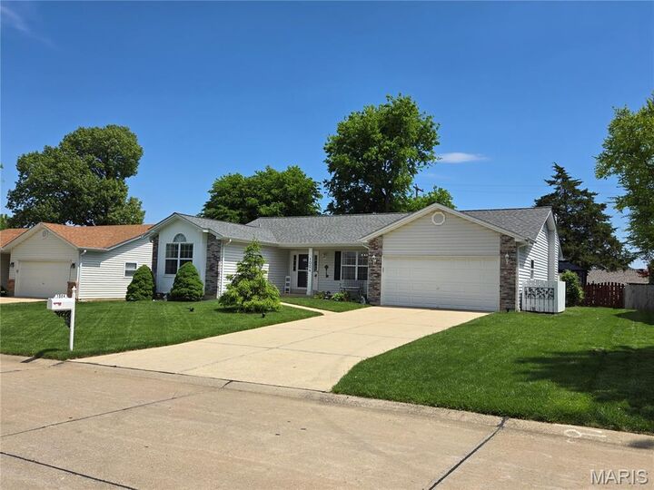 Property Photo:  1004 N Brampton Drive  MO 63304 