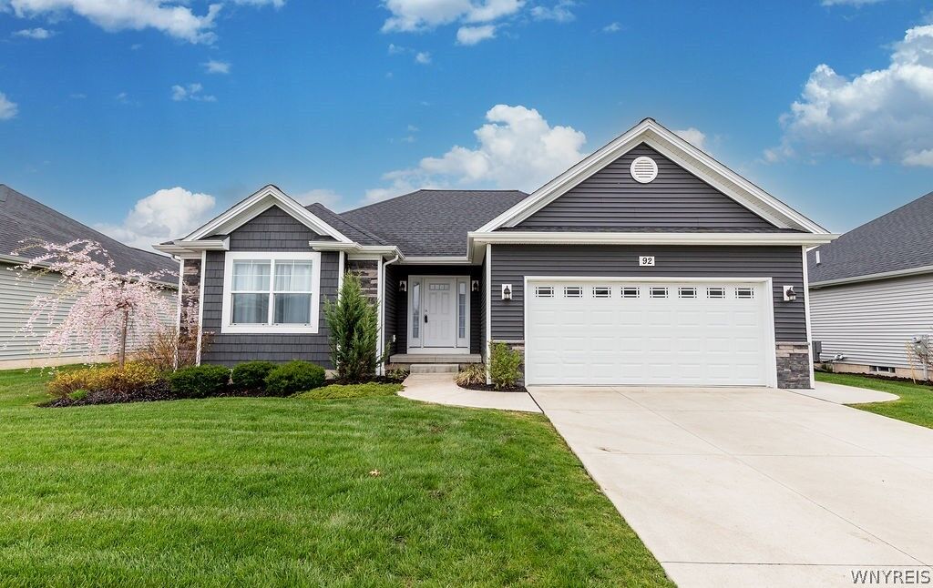 Property Photo:  92 Country Club Court  NY 14072 
