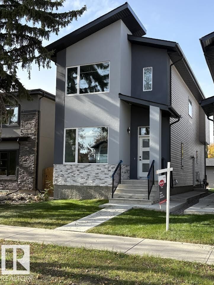 Property Photo: 11032 128 Street NW AB T5M 0W6