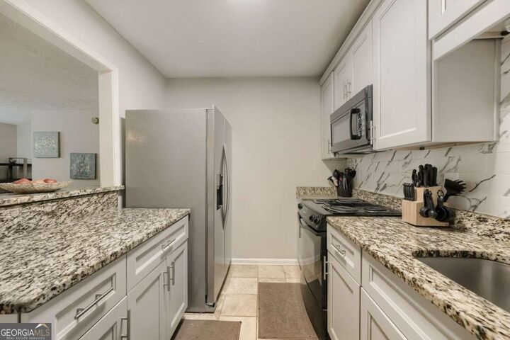Property Photo:  3903 Woodridge Way  GA 30084 