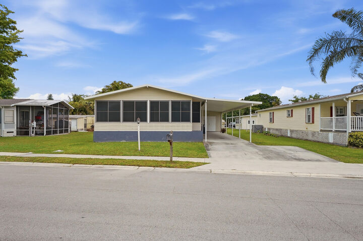 Property Photo:  1500 SW 65th Avenue  FL 33428 