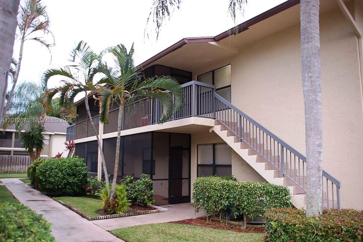 Property Photo:  10025 Winding Lake Rd 202  FL 33351 