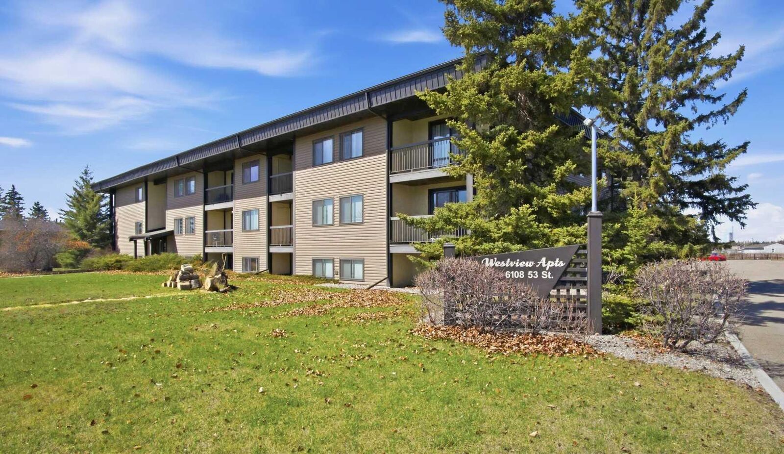 Property Photo:  6108 53 Street 106  AB T4H 1X5 