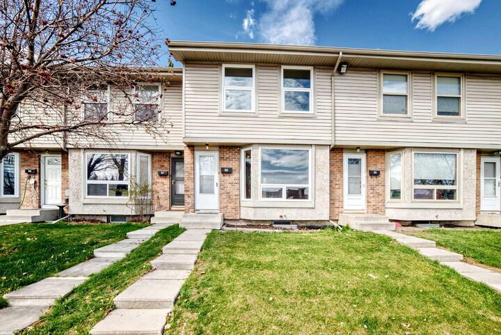 Property Photo:  123 Queensland Drive SE 98  AB T2J 5J4 