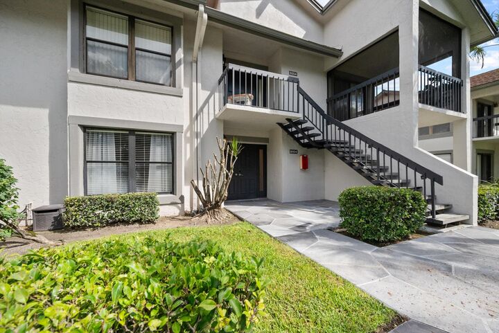 Property Photo:  11355 Pond View Drive D104  FL 33414 