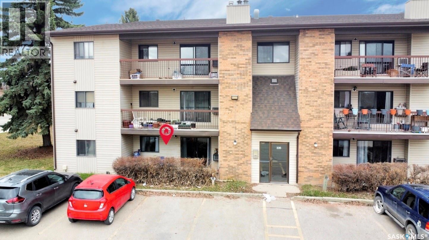 Property Photo:  101 335 Kingsmere Boulevard  SK S7J 4J6 