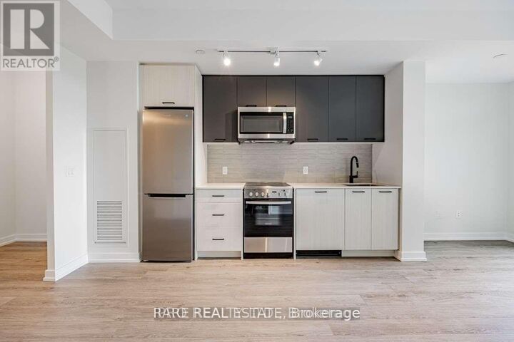 Property Photo:  2300 St Clair Avenue West 415  ON M6N 0B3 