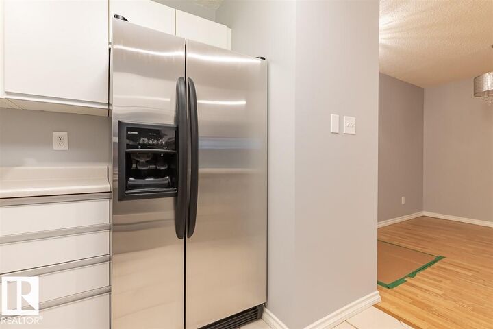 Property Photo:  9010 106 Avenue NW 108  AB T5H 2K3 