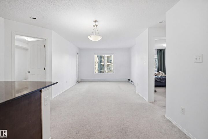 Property Photo:  11812 22 Ave SW 205  AB T6W 2A2 