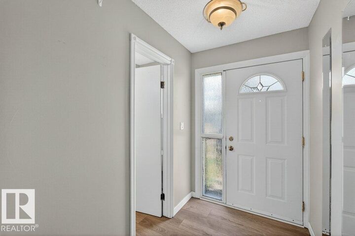Property Photo:  9909 171 Avenue NW  AB T5X 4X2 