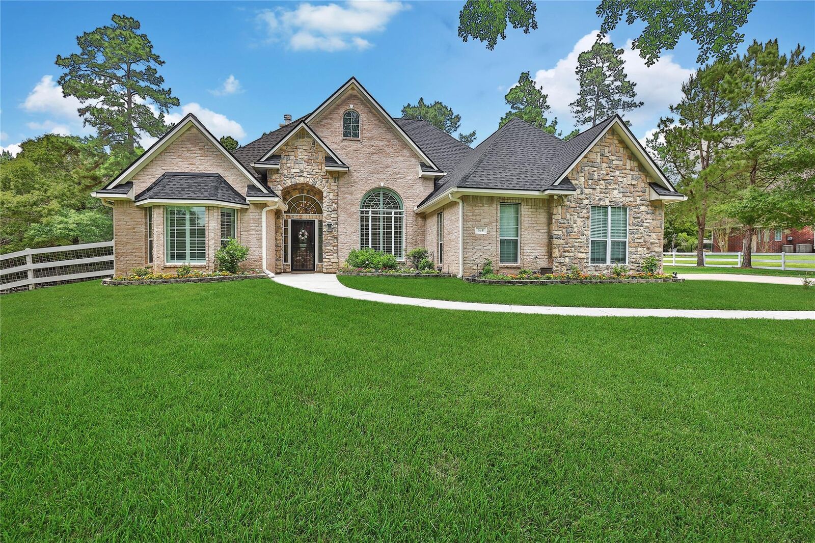 Property Photo:  345 Ridgelake Scenic Drive  TX 77316 