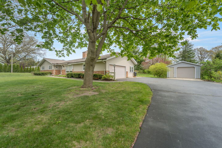 Property Photo:  W221s7400 Valley View Rd  WI 53150 