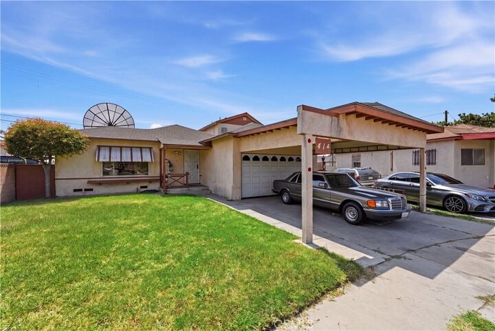 Property Photo:  414 E 137th  CA 90061 