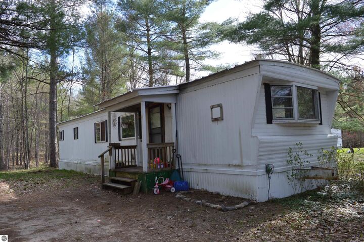 Property Photo:  12575 M-72  MI 49646 