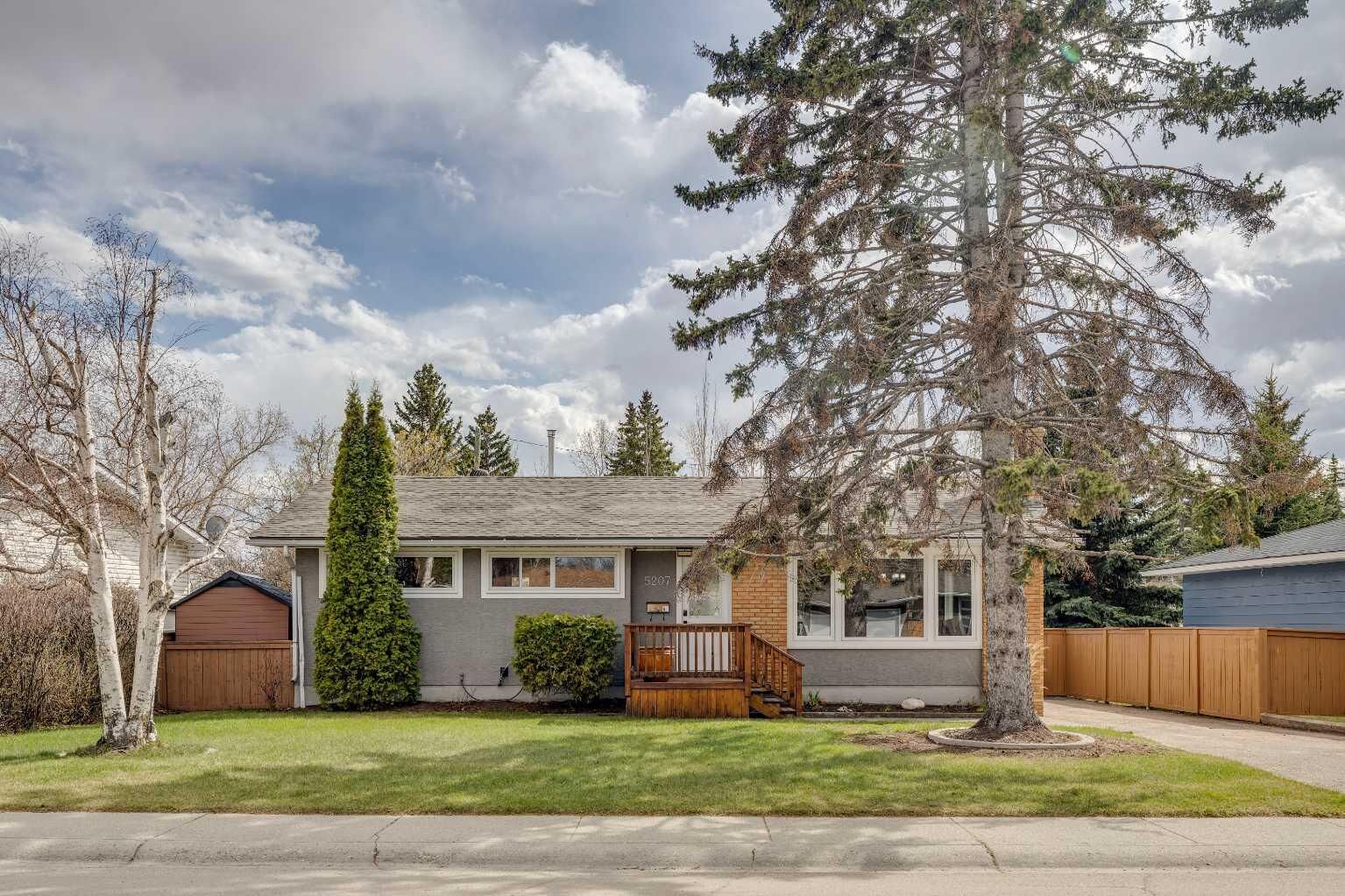 Property Photo:  5207 Grove Hill Road SW  AB T3E 4G7 