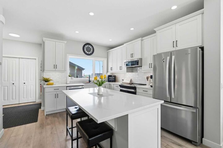 Property Photo: 120 Treeline Manor SW AB T2Y 0R7